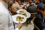 waiter serving food restaurant